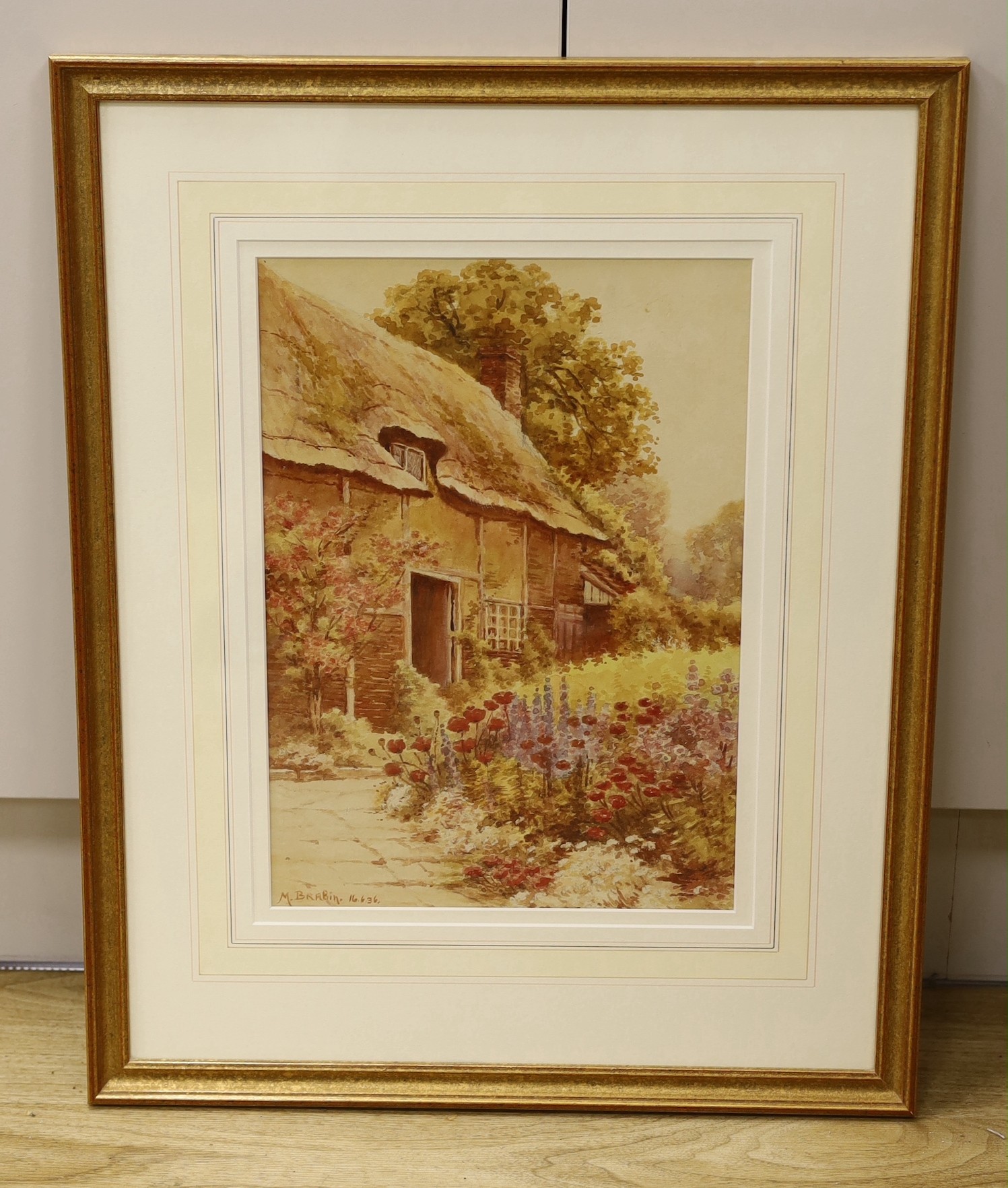 M. Brabin, watercolour, Cottage and flower garden, signed and dated '36, 37 x 26cm
